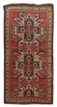 A Caucasian Wool Rug, 8 feet 7 inches x 4 feet 3 inches.