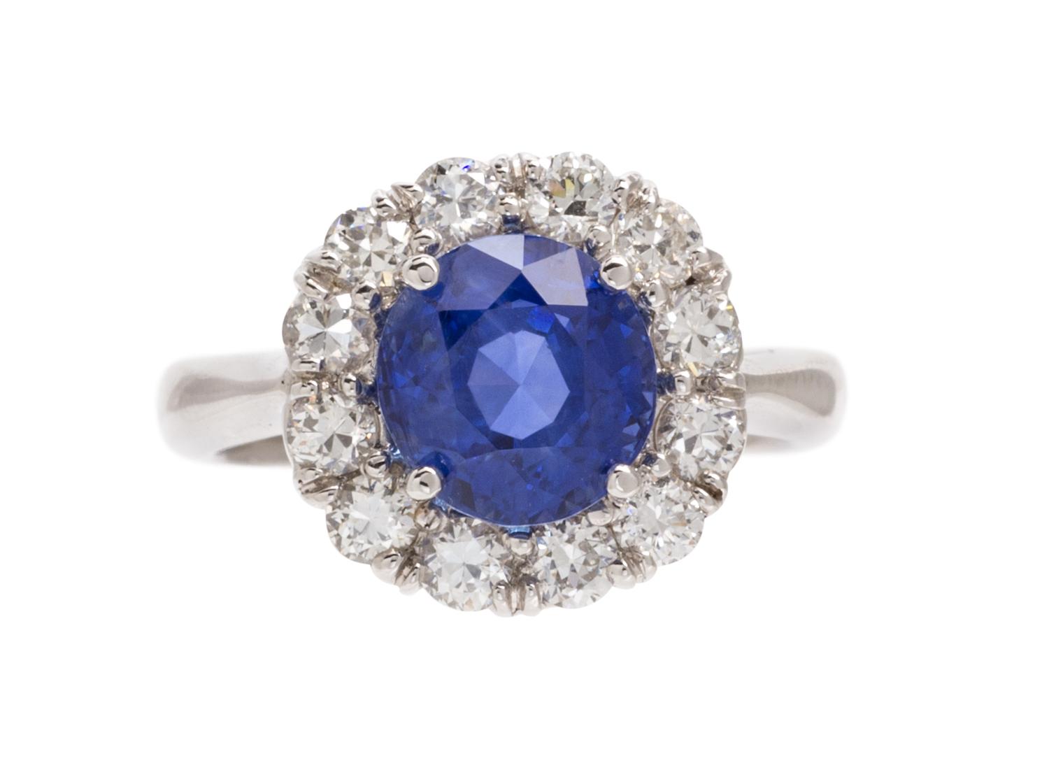 An 18 Karat White Gold, Burmese Sapphire and Diamond Ring, 5.80 dwts.
