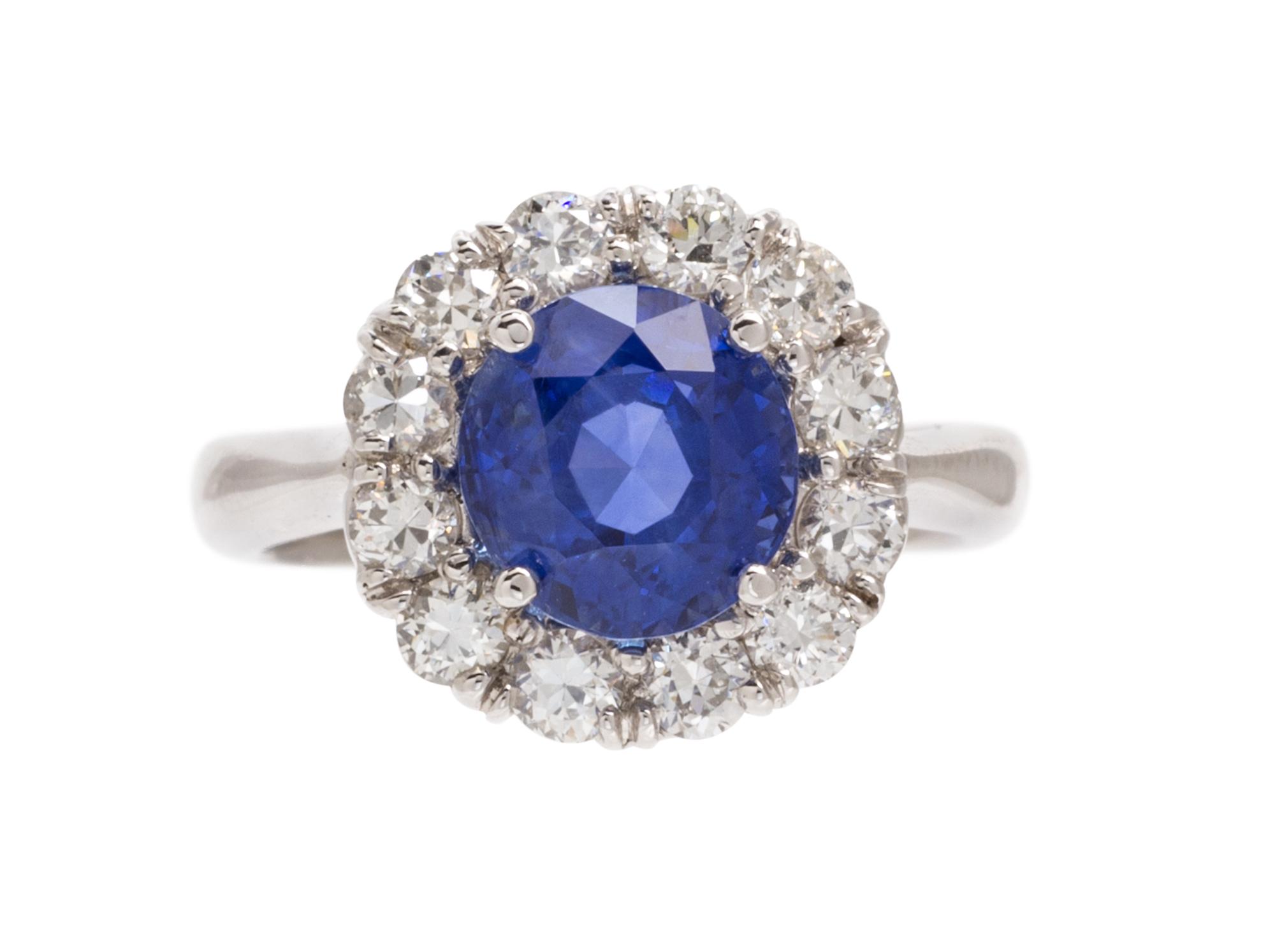 An 18 Karat White Gold, Burmese Sapphire and Diamond Ring, 5.80 dwts.