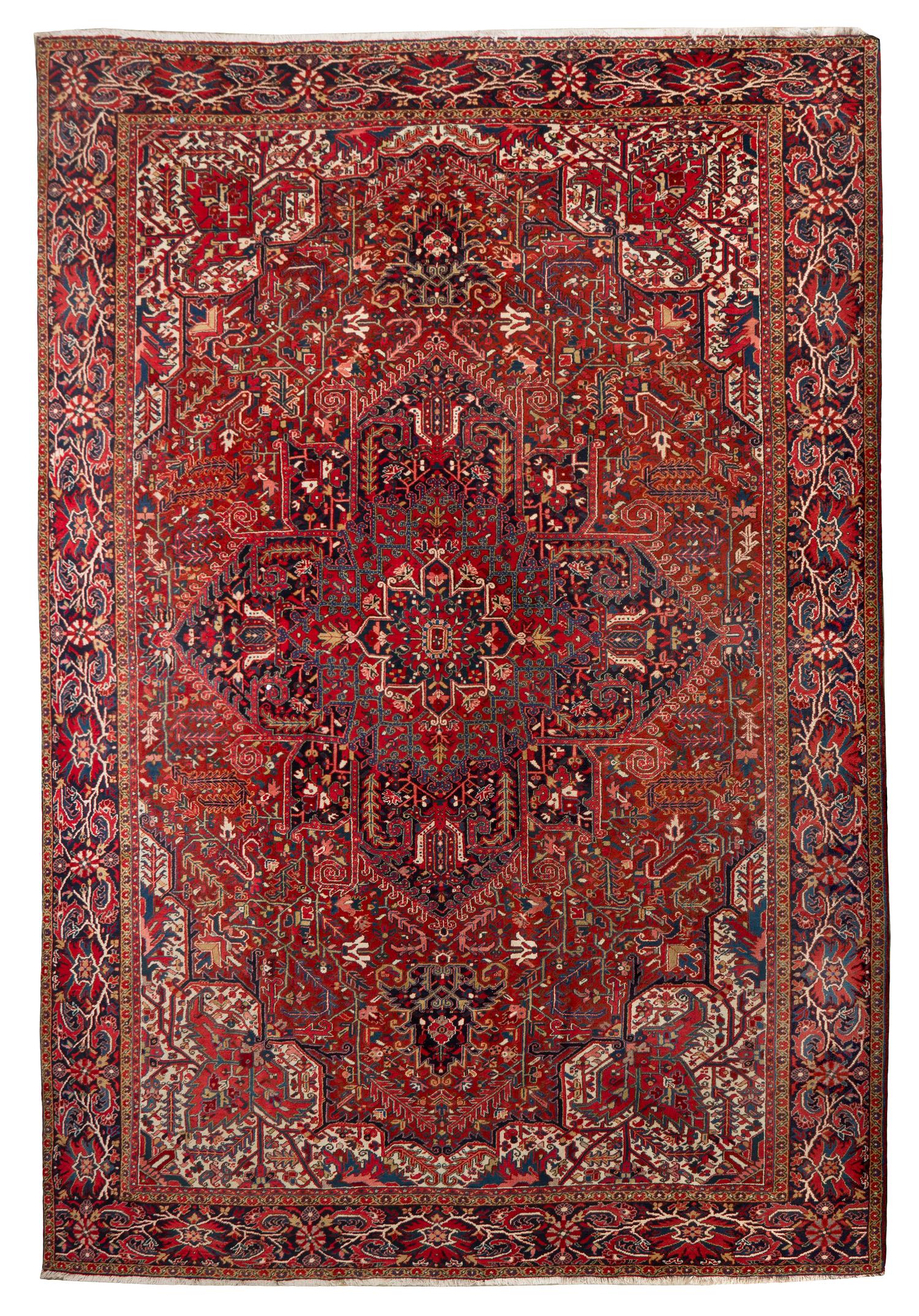 A Heriz Wool Rug, 16 feet 4 inches x 11 feet 5 inches.