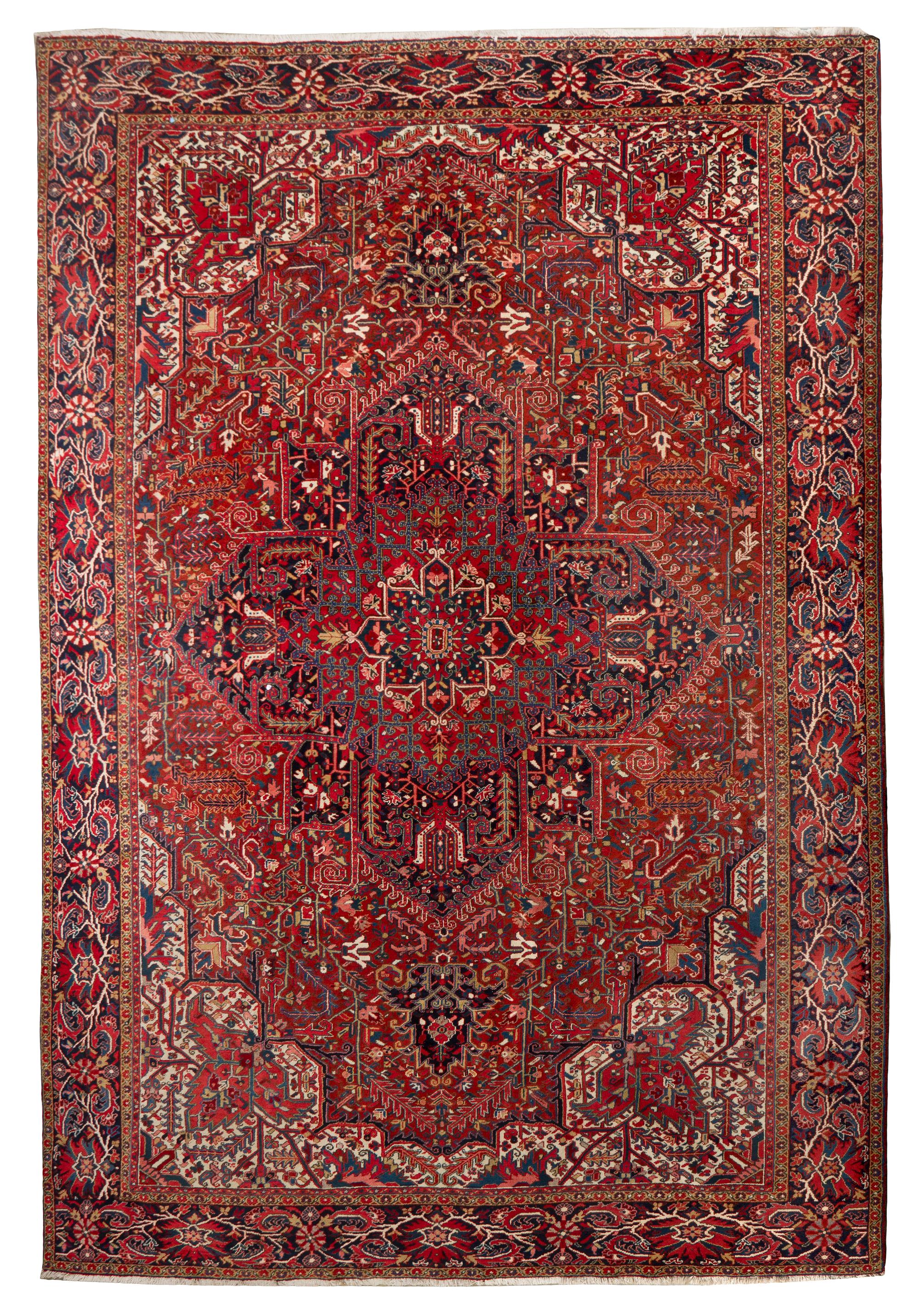 A Heriz Wool Rug, 16 feet 4 inches x 11 feet 5 inches.