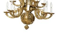 A French Empire Style Gilt Bronze Twelve-Light Chandelier — 20TH CENTURY