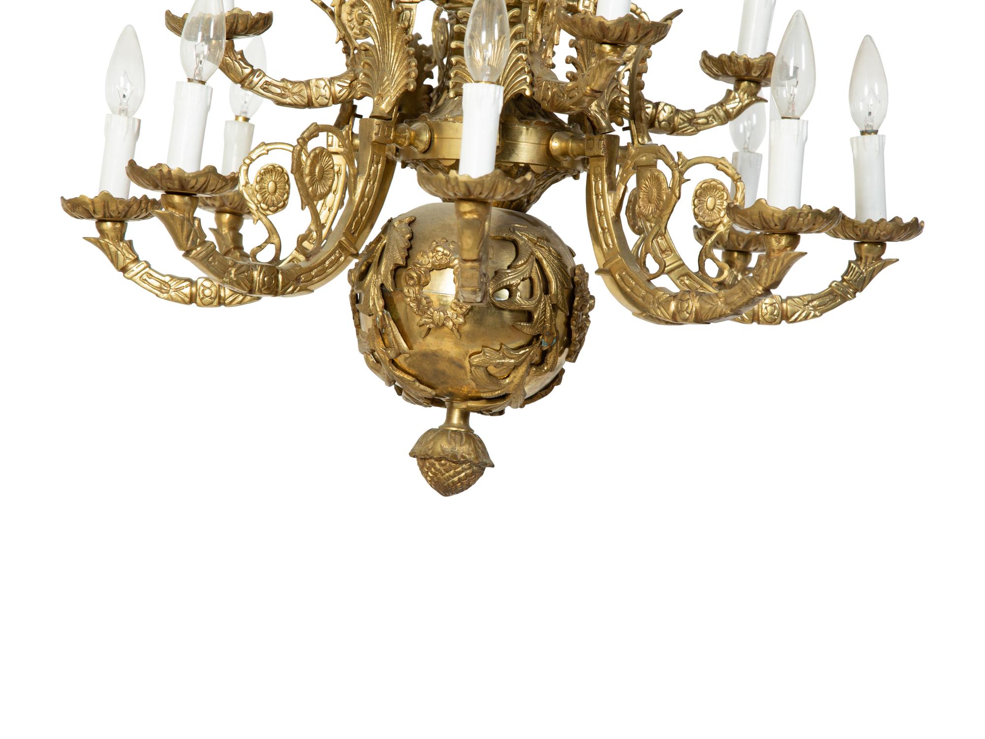 A French Empire Style Gilt Bronze Twelve-Light Chandelier — 20TH CENTURY
