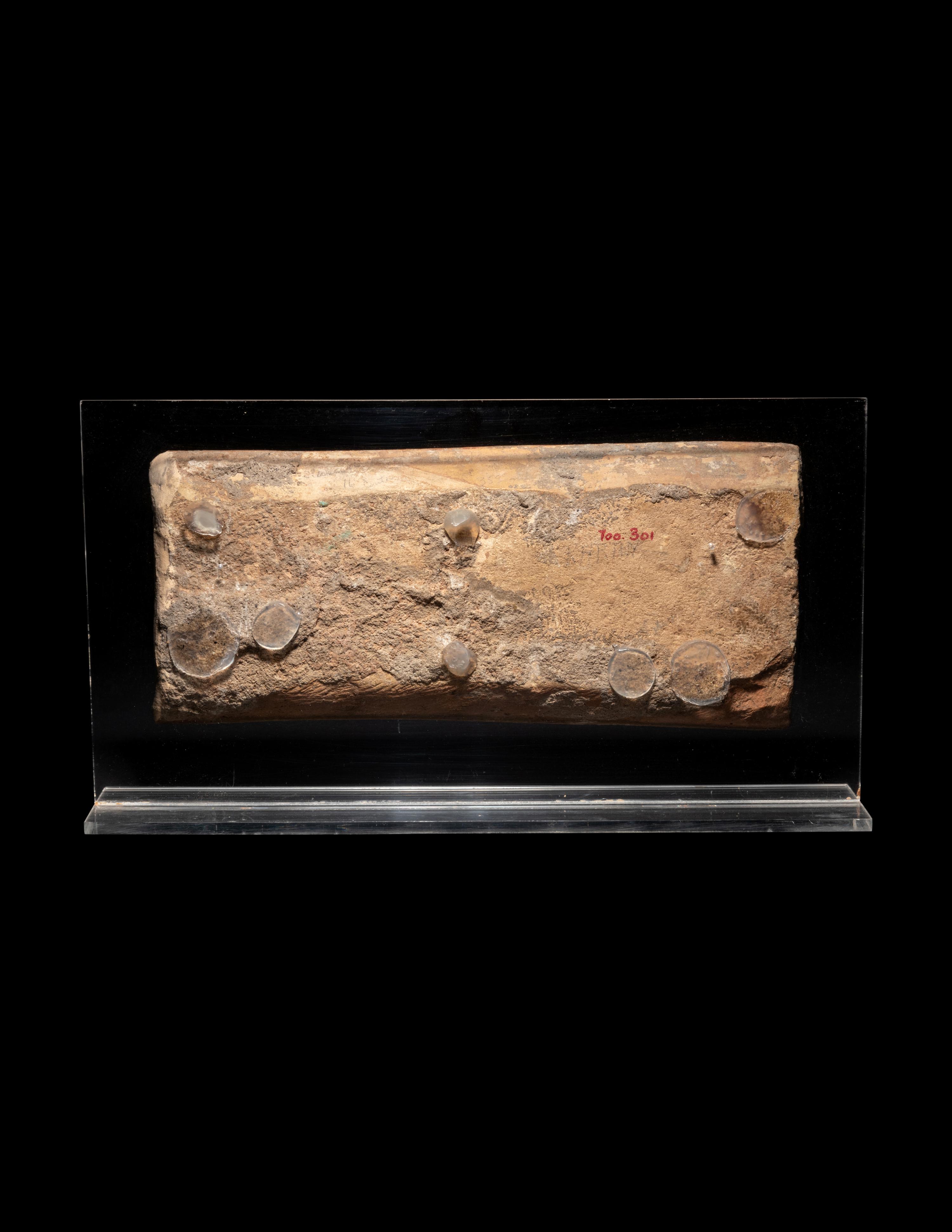A Molded Turquoise Glazed Pottery Border Tile