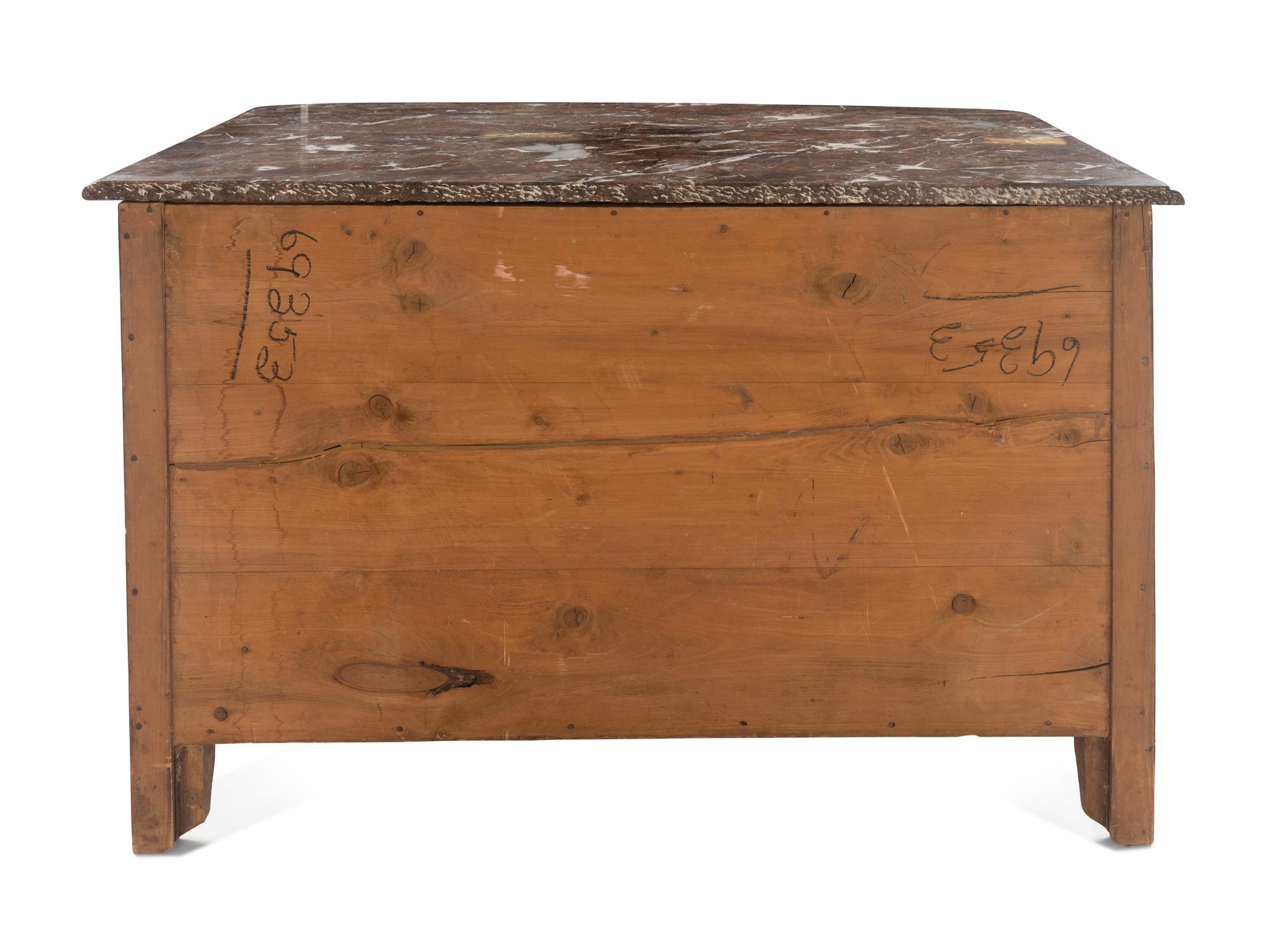 A Régence Gilt Bronze Mounted Marble-Top Commode