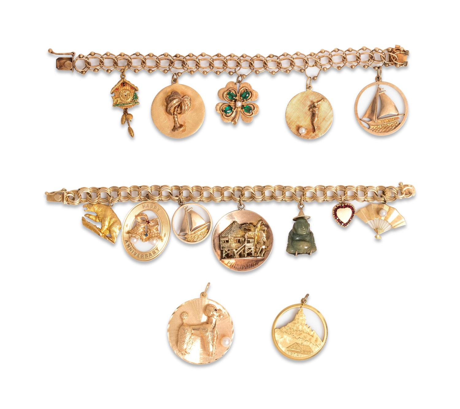 COLLECTION OF YELLOW GOLD CHARM BRACELETS
