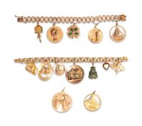 COLLECTION OF YELLOW GOLD CHARM BRACELETS