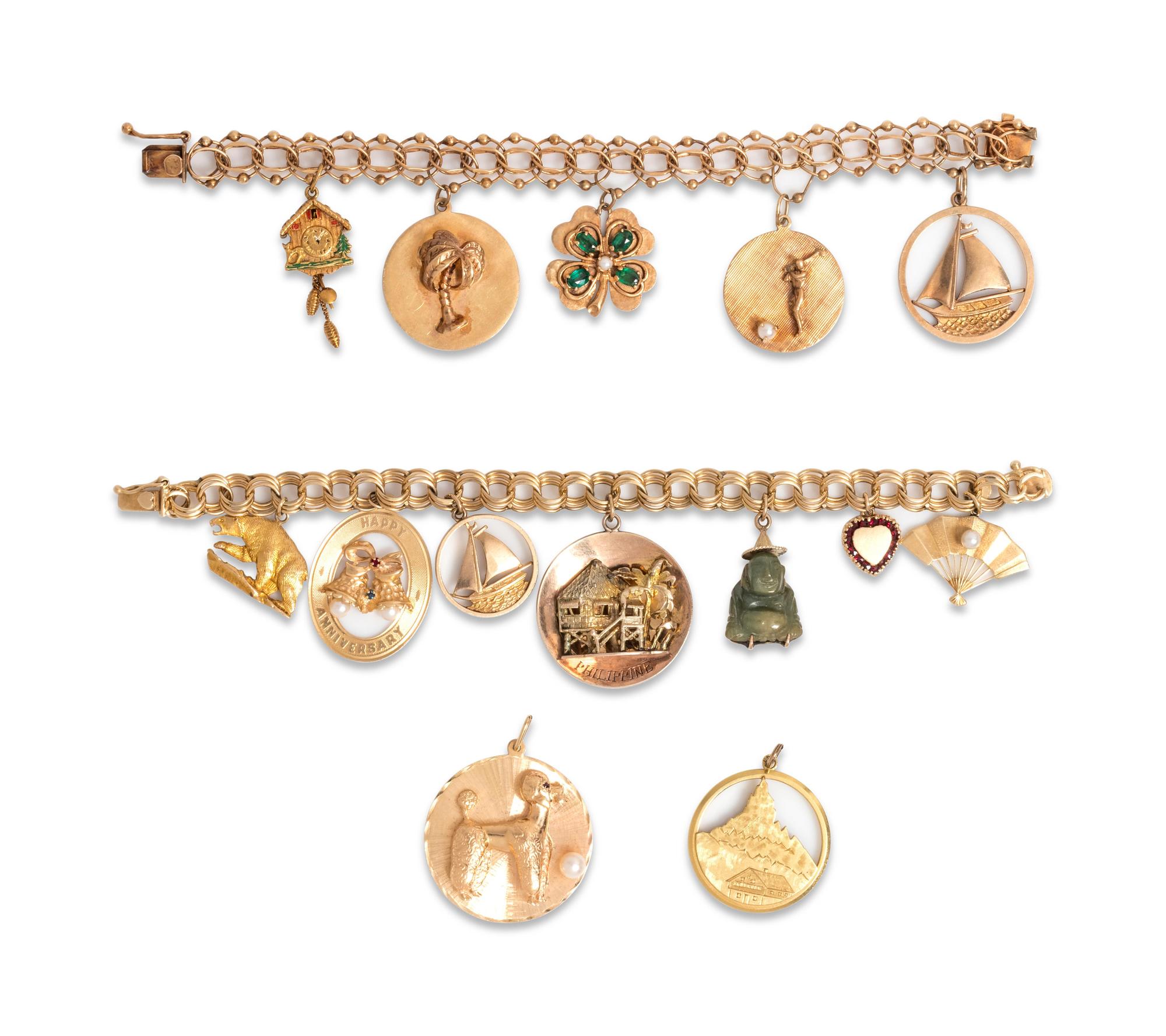 COLLECTION OF YELLOW GOLD CHARM BRACELETS