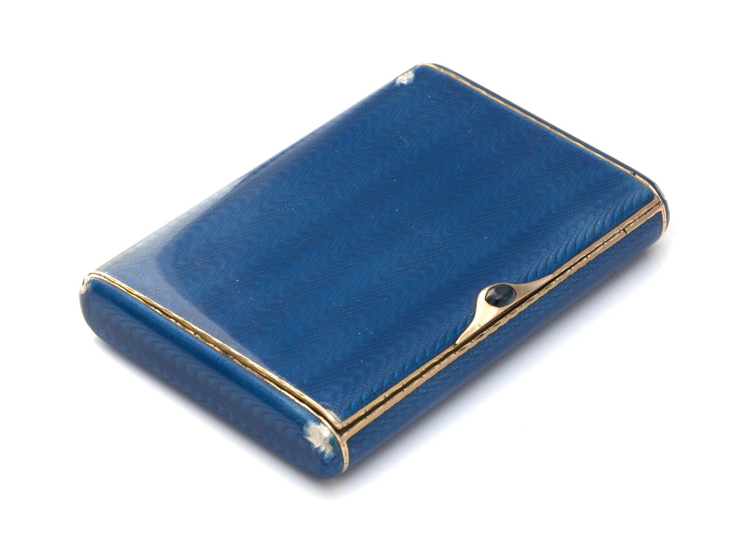 A Russian Guilloche Enameled Silver Cigarette Case, Late 19th Century, with a cabochon clasp.