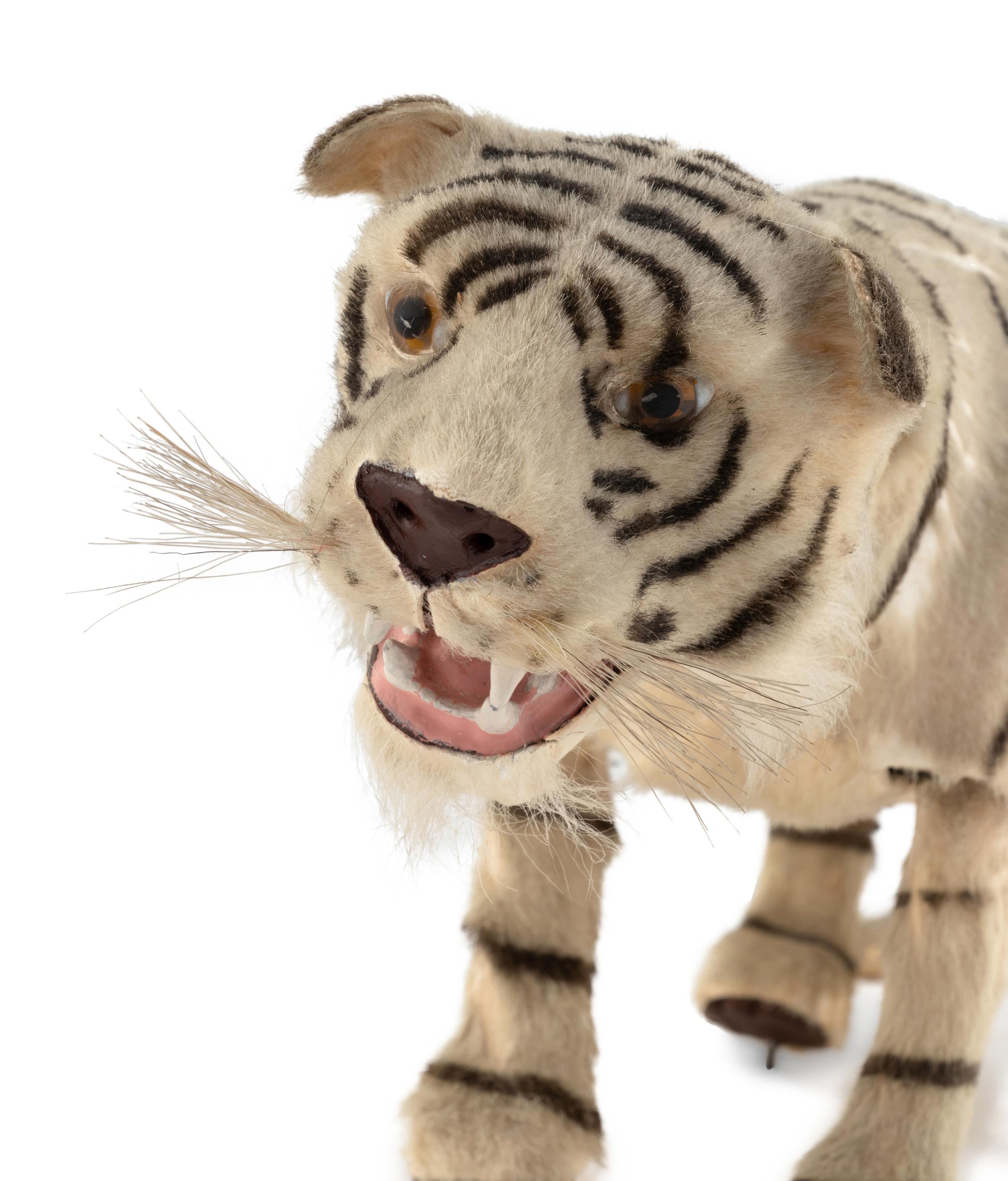 A French Jumping and Growling Tiger Automaton