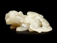 A White Jade Figure of a Mythical Beast