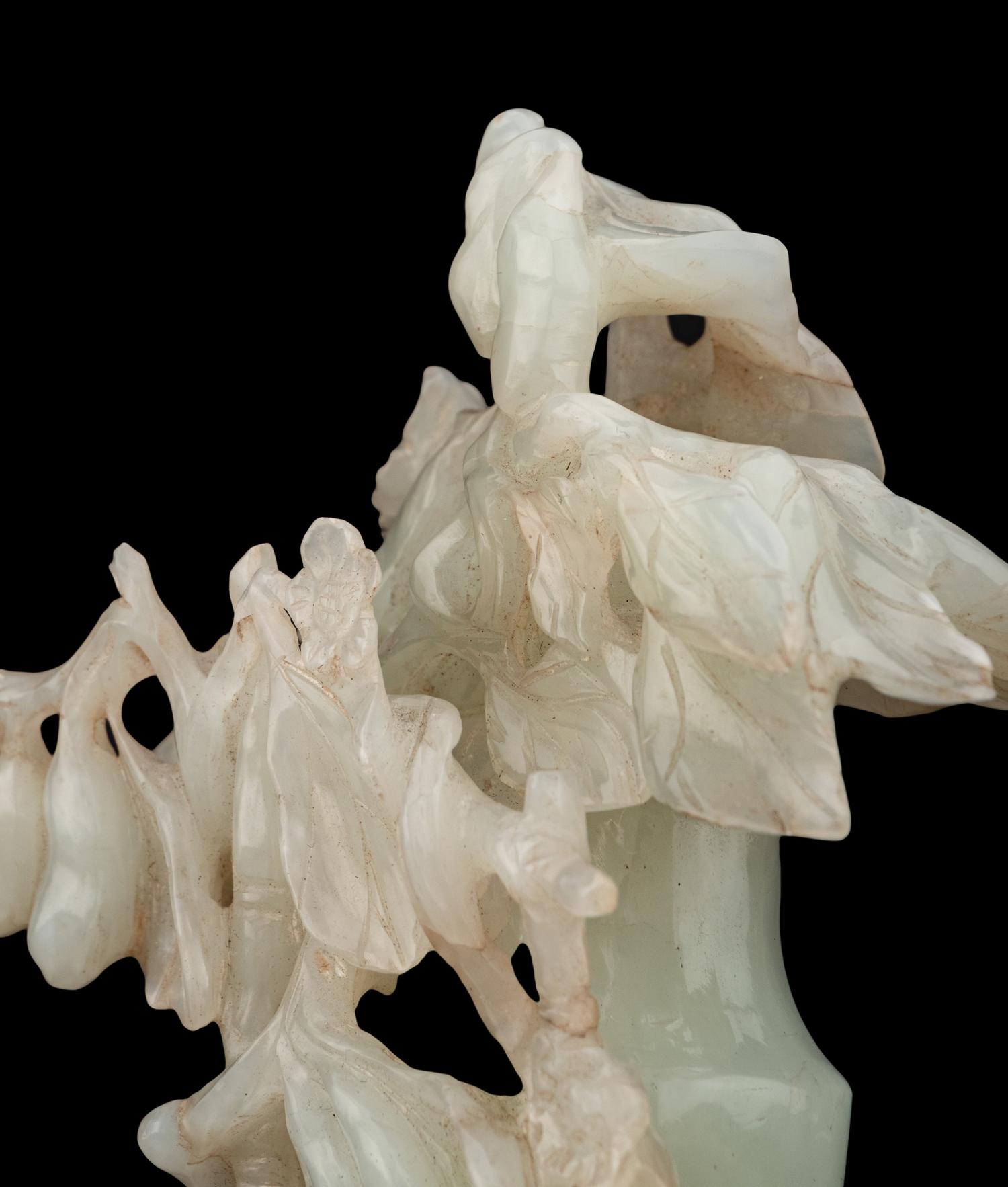 A Small Chinese Openwork Pale Celadon Jade Covered Vase