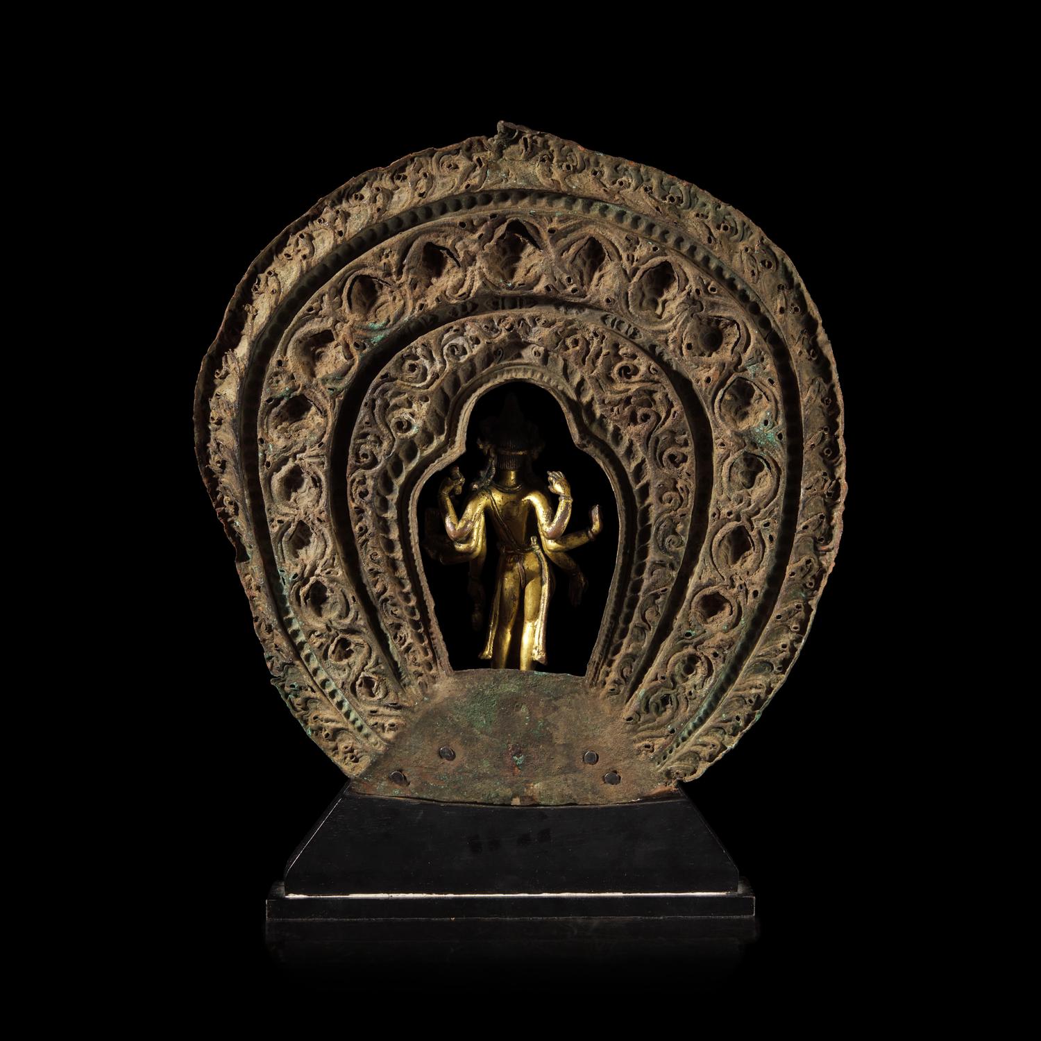 A Nepalese Gilt Bronze Standing Figure of Avalokiteshvara, 14th/15th Century 十四/十五世紀 尼泊爾銅鎏金菩薩立像