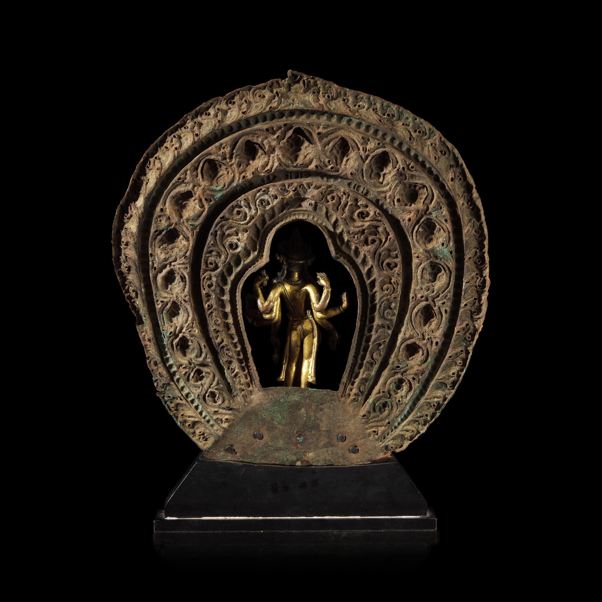 A Nepalese Gilt Bronze Standing Figure of Avalokiteshvara, 14th/15th Century 十四/十五世紀 尼泊爾銅鎏金菩薩立像