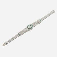 An Art Deco emerald, diamond, and platinum bracelet