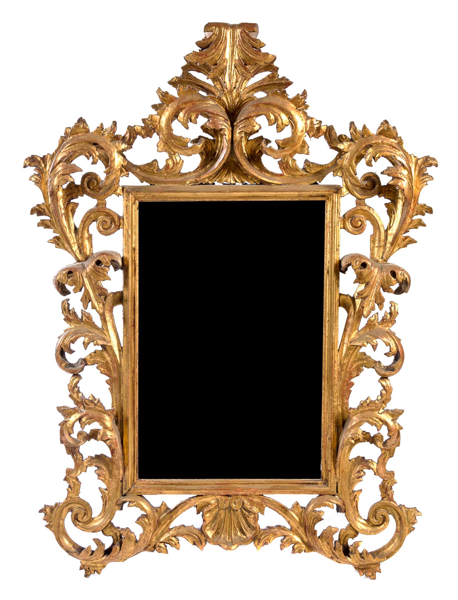 An Italian Baroque Style Giltwood Mirror Height 45 x width 42 inches. — 20TH CENTURY