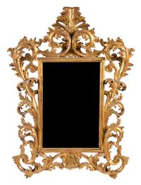 An Italian Baroque Style Giltwood Mirror Height 45 x width 42 inches. — 20TH CENTURY