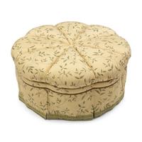 A Custom-Upholstered Circular Ottoman