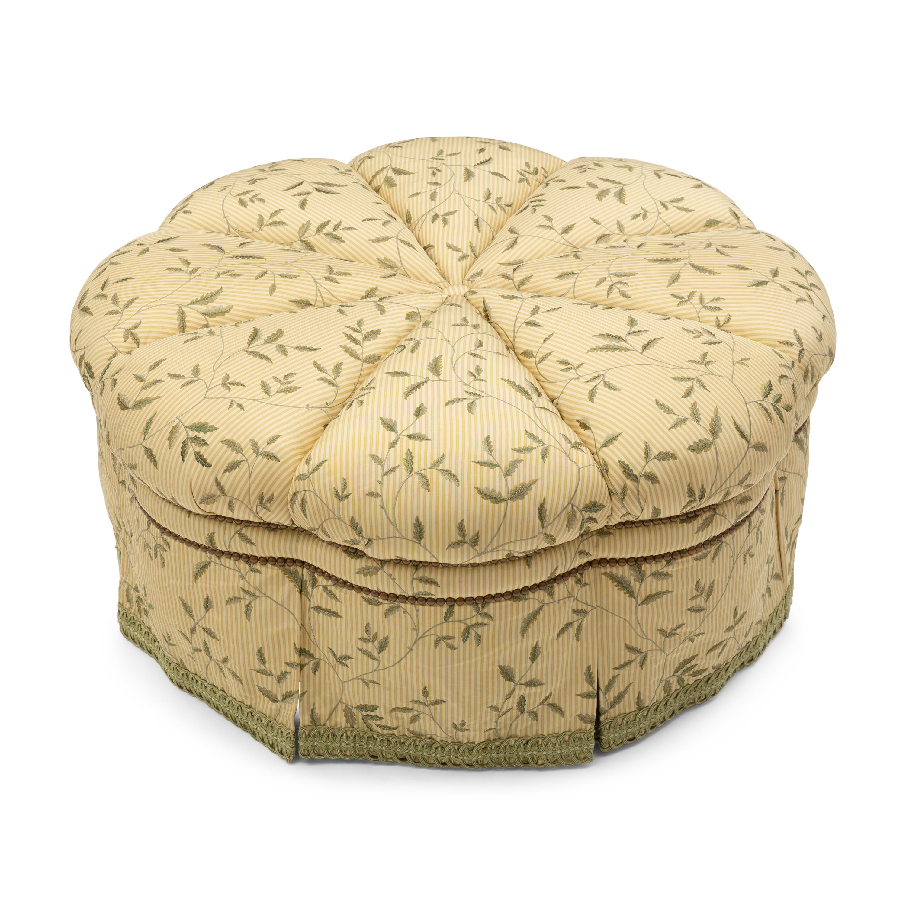 A Custom-Upholstered Circular Ottoman