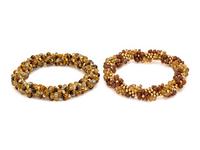 COLLECTION OF YELLOW GOLD AND GEMSTONE BEADED BRACELETS