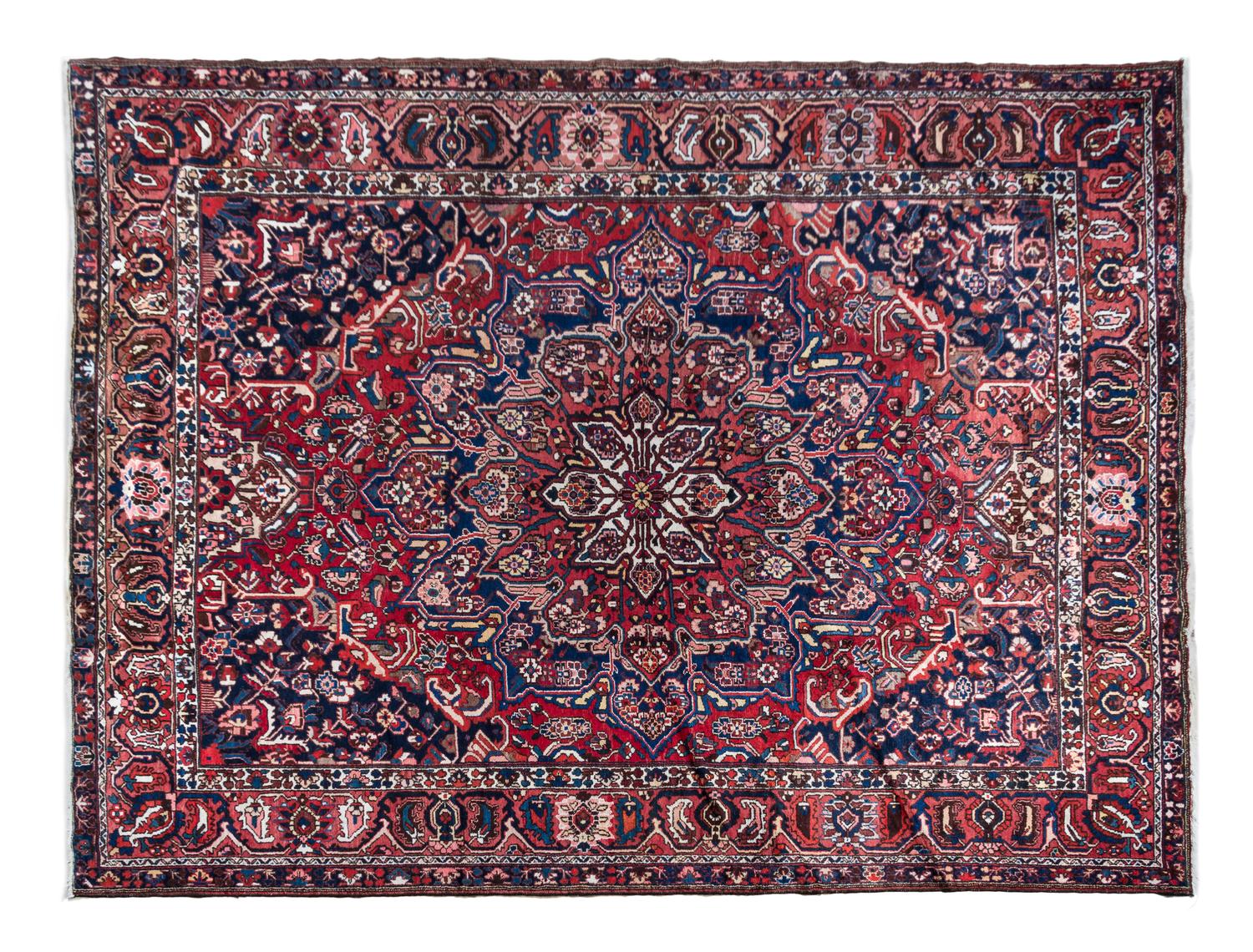 A Heriz Wool Rug — FIRST HALF 20TH CENTURY