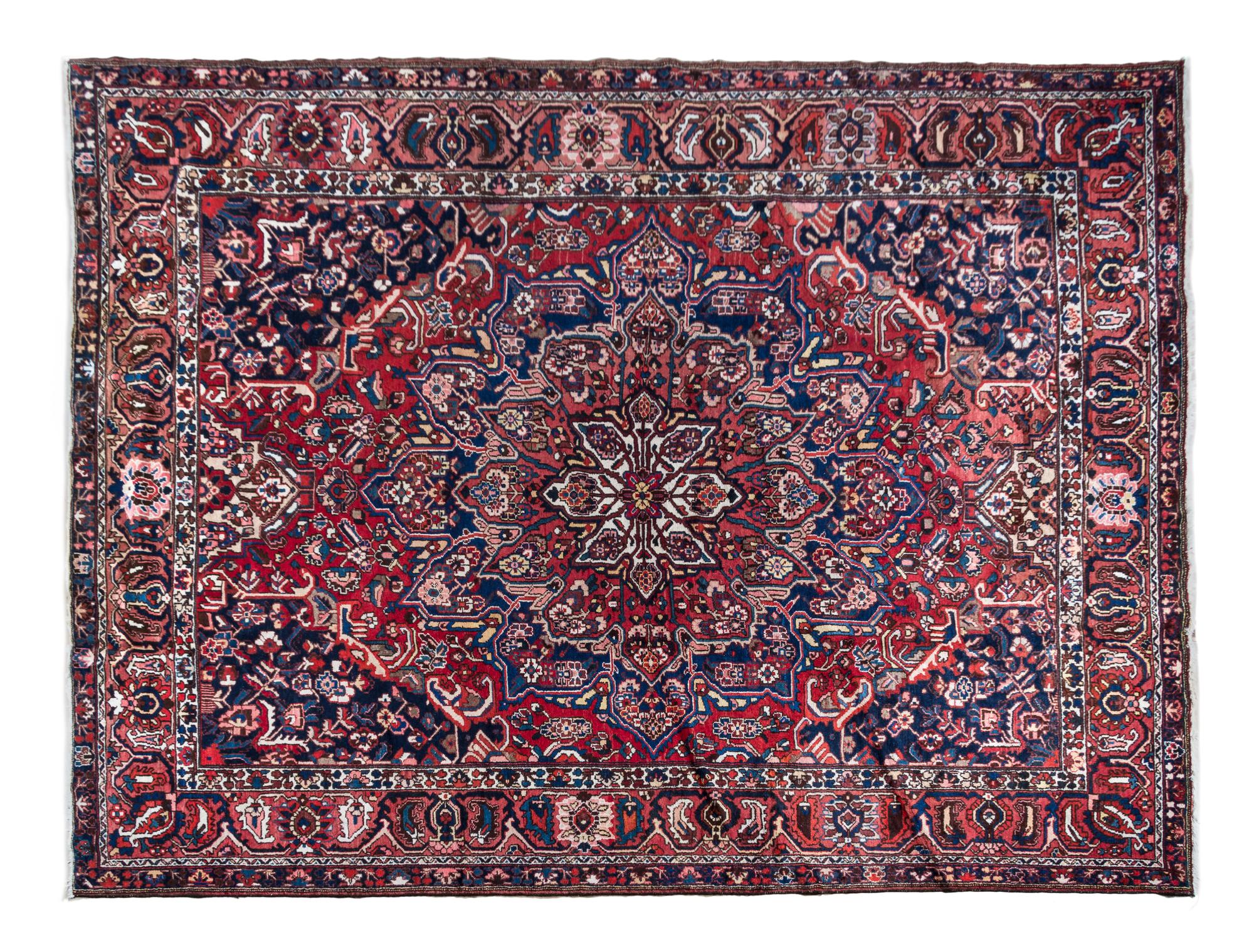 A Heriz Wool Rug — FIRST HALF 20TH CENTURY