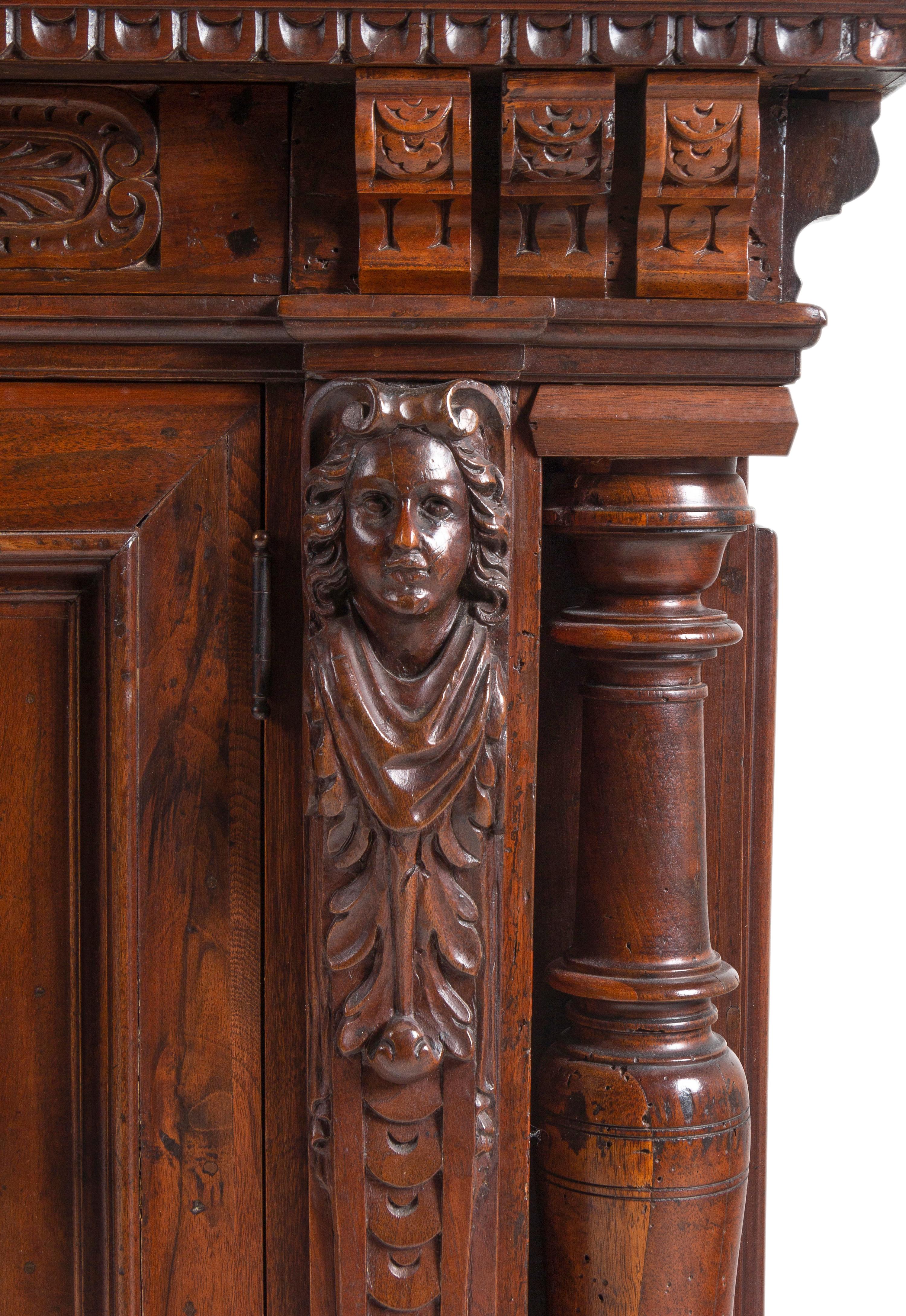 An Italian Baroque Style Carved Walnut and Burl Walnut Fall-Front Bureau Cabinet