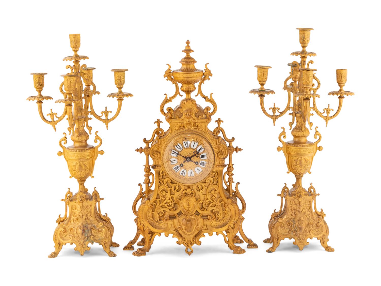 A French Gilt Bronze Clock Garniture