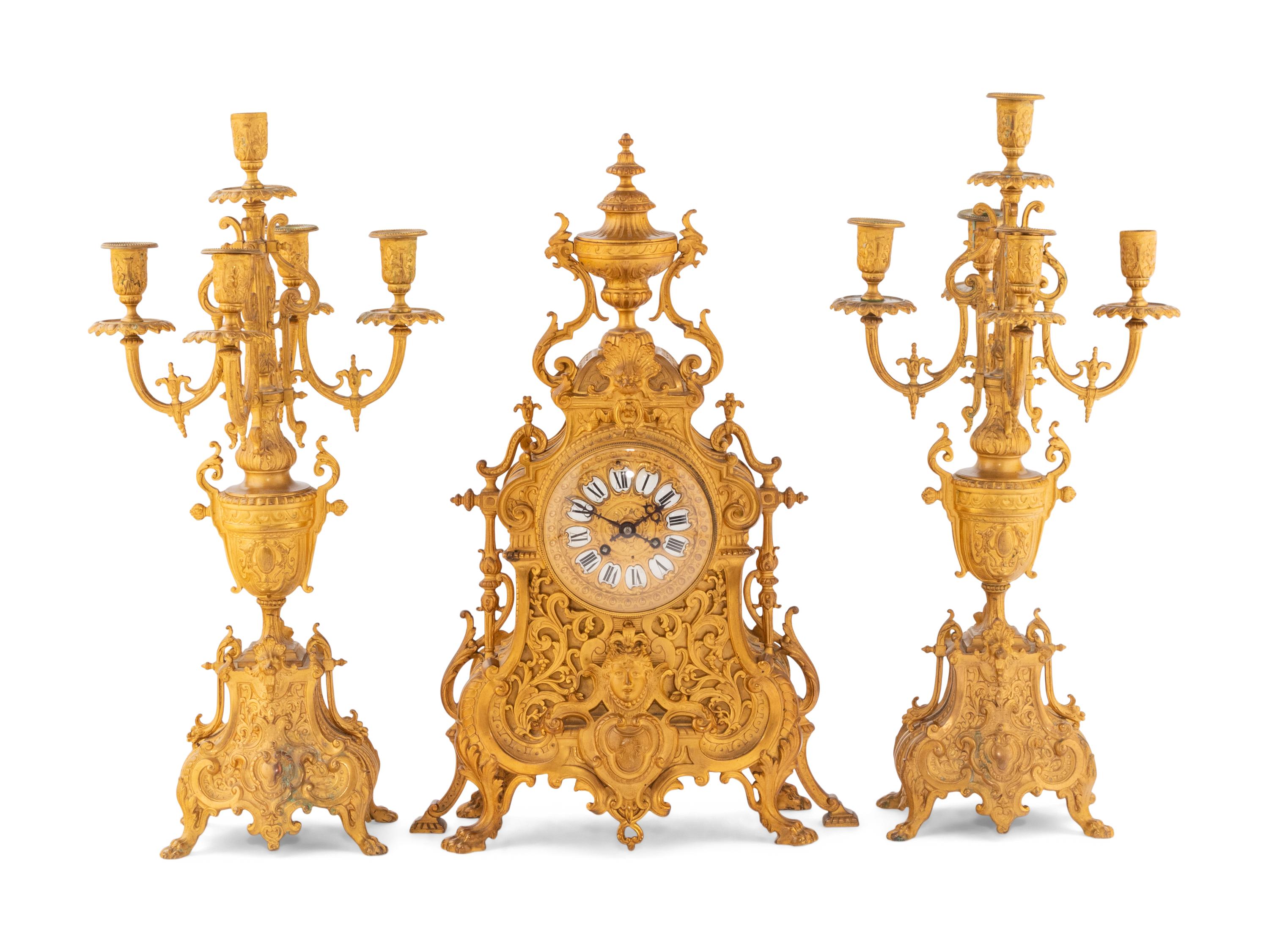 A French Gilt Bronze Clock Garniture