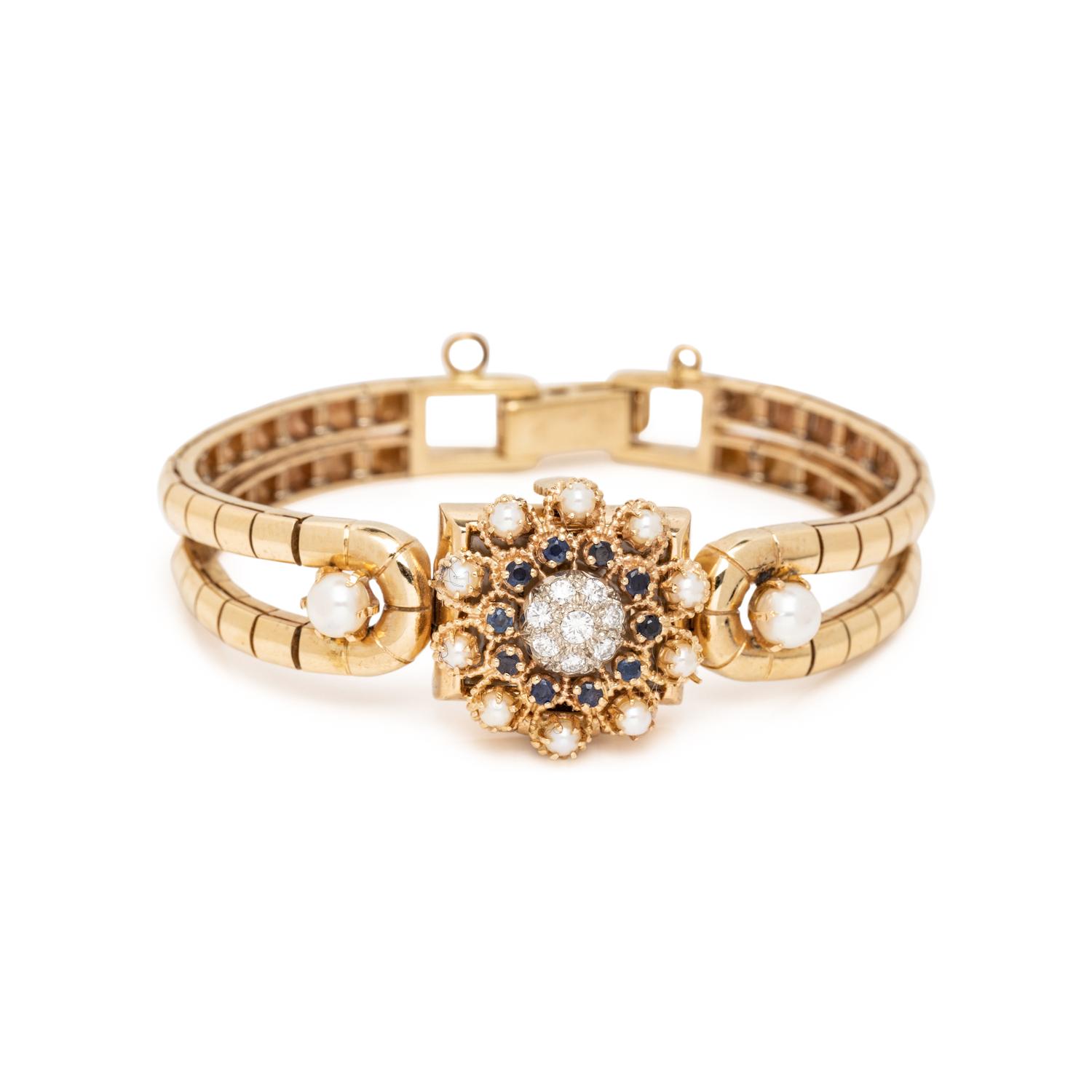 TOURNEAU, YELLOW GOLD, DIAMOND, SAPPHIRE AND CULTURED PEARL SURPRISE WATCH