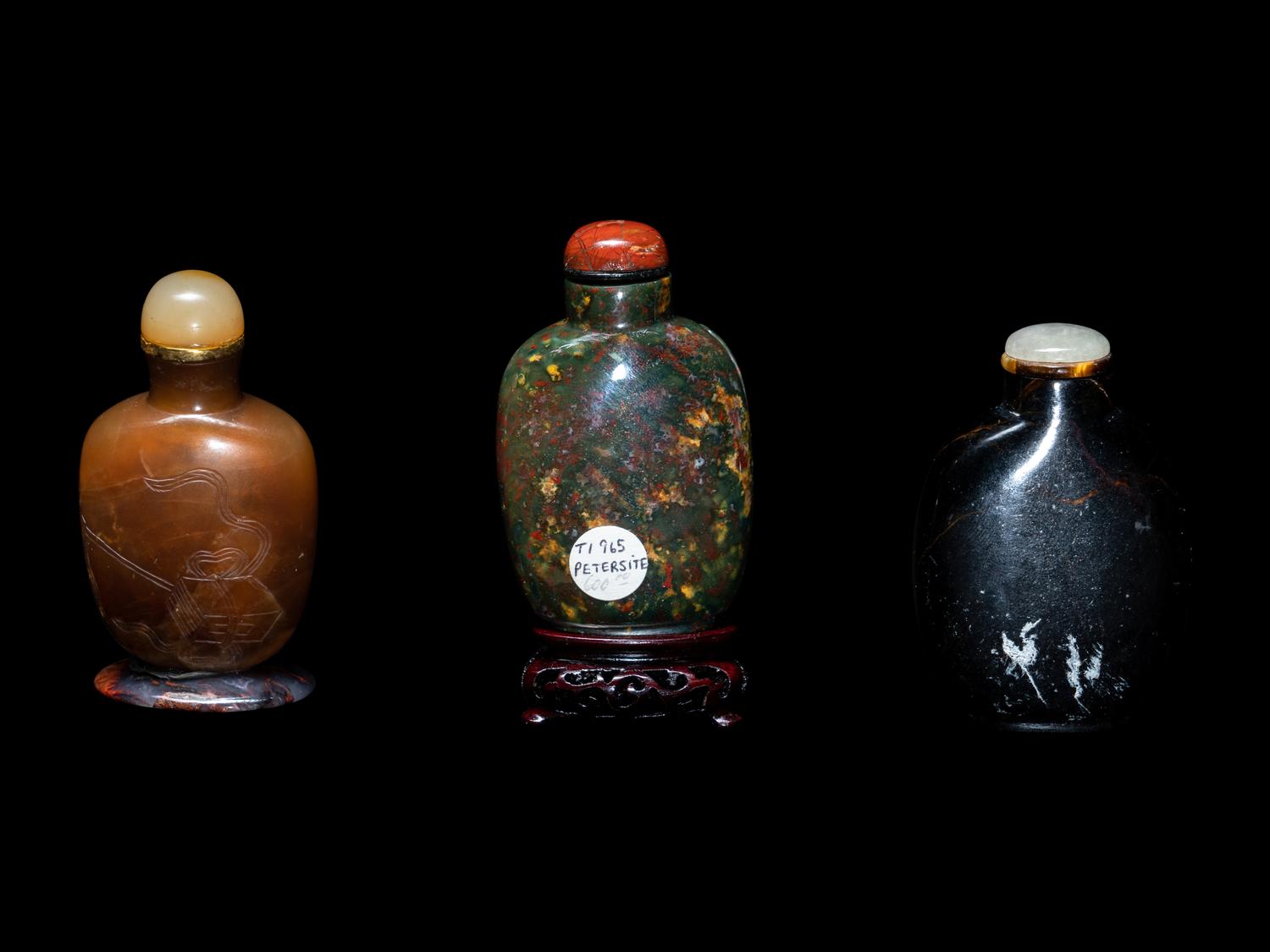 Three Chinese Carved Hardstone Snuff Bottles