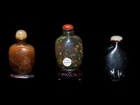 Three Chinese Carved Hardstone Snuff Bottles