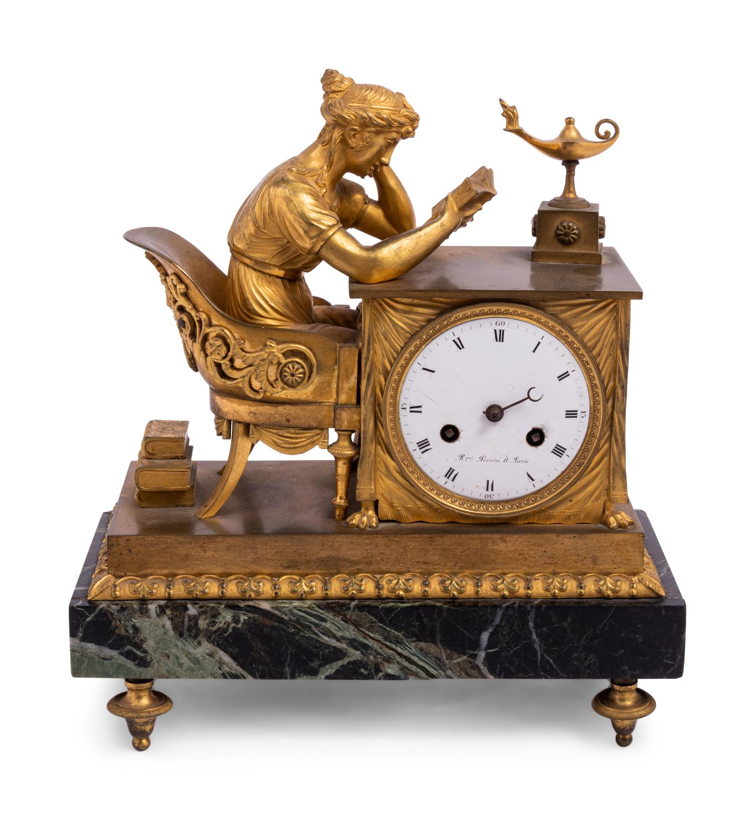 An Empire Gilt Bronze and Marble Figural Mantel Clock