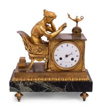 An Empire Gilt Bronze and Marble Figural Mantel Clock
