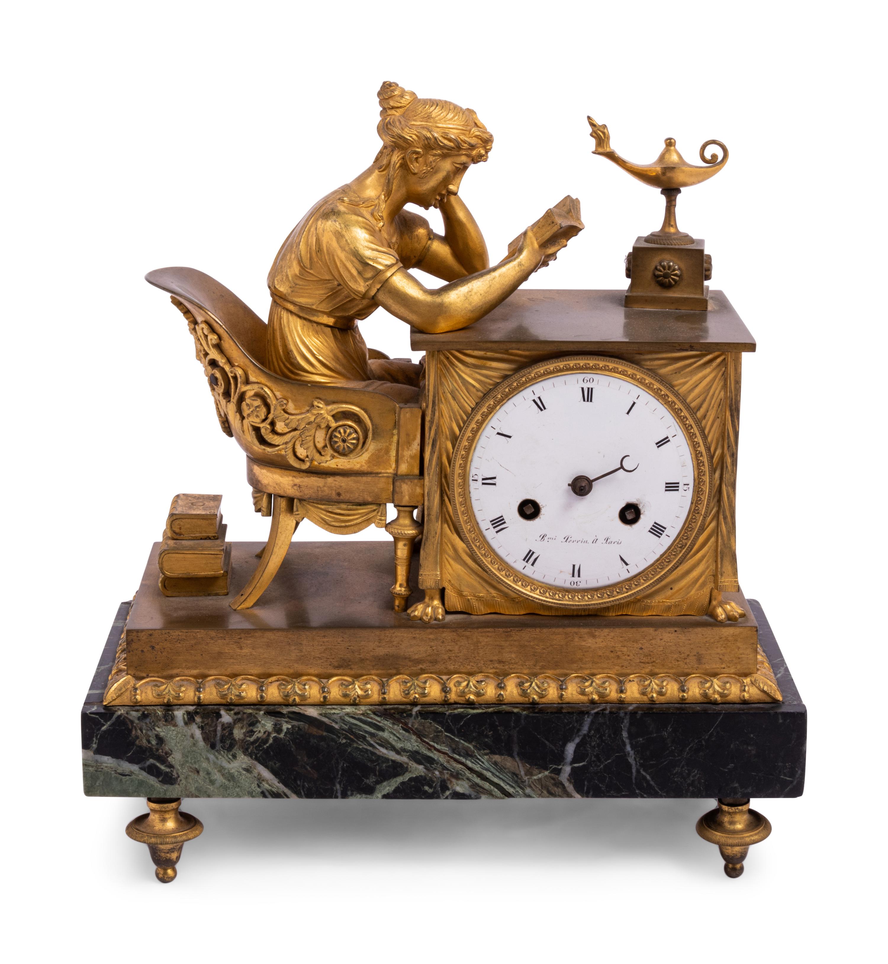 An Empire Gilt Bronze and Marble Figural Mantel Clock