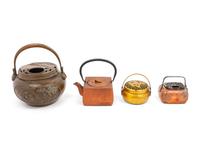 Four Chinese Hand Warmers and Teapot