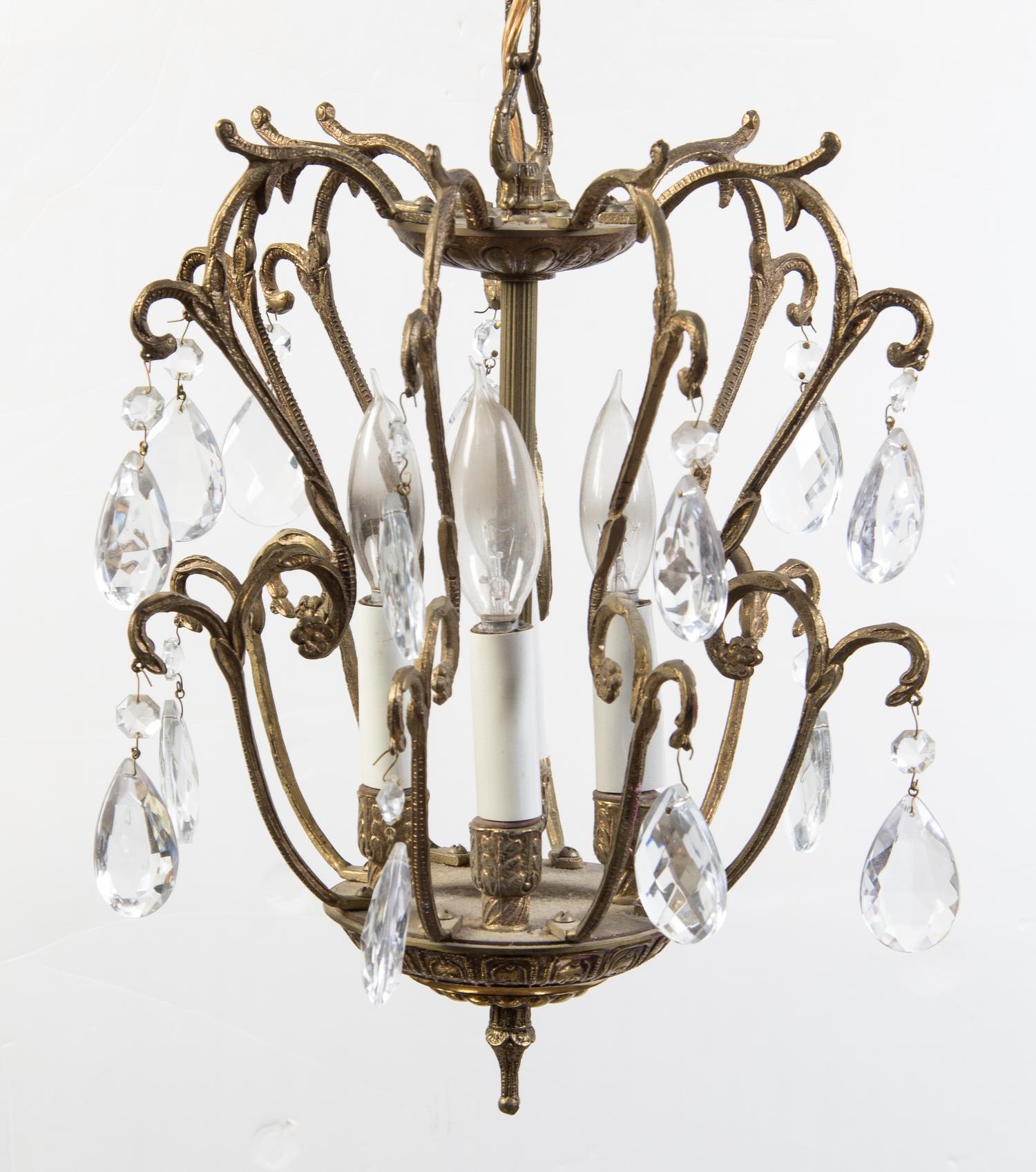 A Continental Gilt Metal Four-Light Chandelier Height 13 1/2 inches.