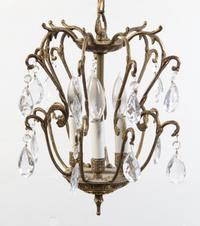 A Continental Gilt Metal Four-Light Chandelier Height 13 1/2 inches.