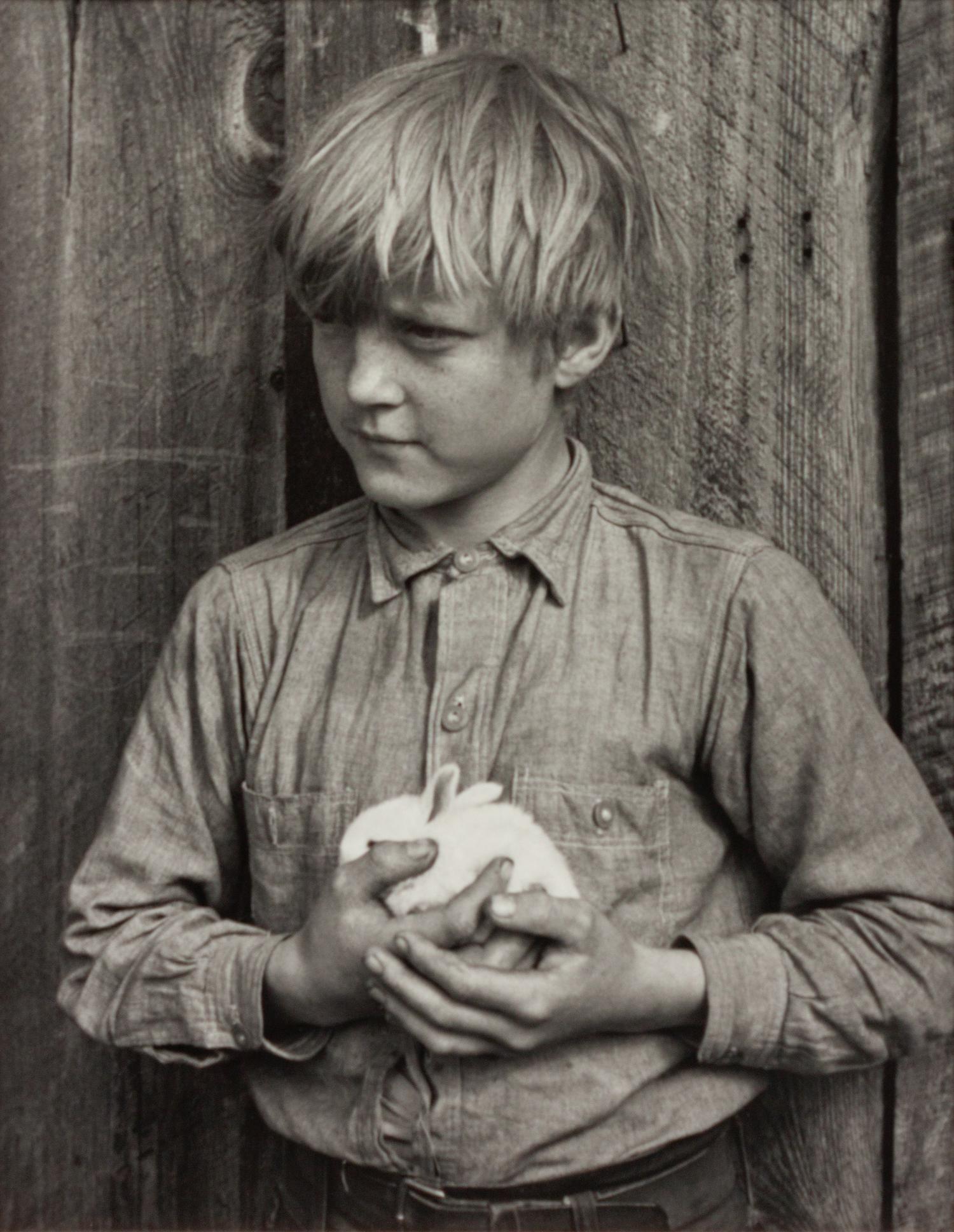 A group of five photographs ( Streets of San Francisco - Winos Arguing , 1936 (printed 1990); Ma Joad #4, Crying , 1938 (printed 1990); Winfield with Rabbit , 1938 (printed 1990); Migrant Writing Home , 1938 (printed 1990); Joad Family Applying for Relief Aid , 1938 (printed later)