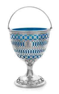 A George III Reticulated Silver Sugar Basket with Glass Liner, Hester Bateman, London, 1783, of ovoid form, having a beaded edge and a
