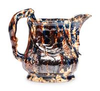 A Large Yellowware Pitcher with Spectacular Blue Flint Enamel Glaze
