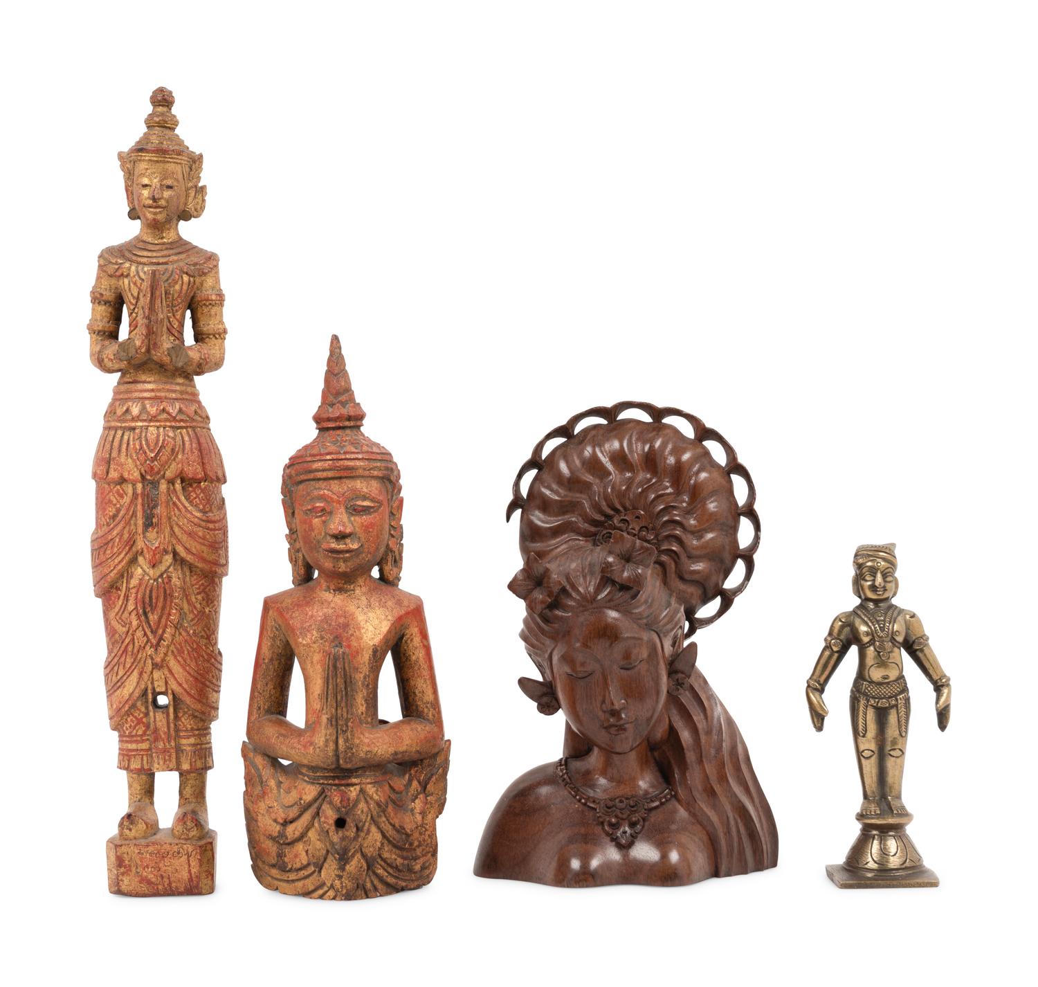 An Indonesian Carved Wood Bust, Two Thai Giltwood Figures and an Indian Brass Figure