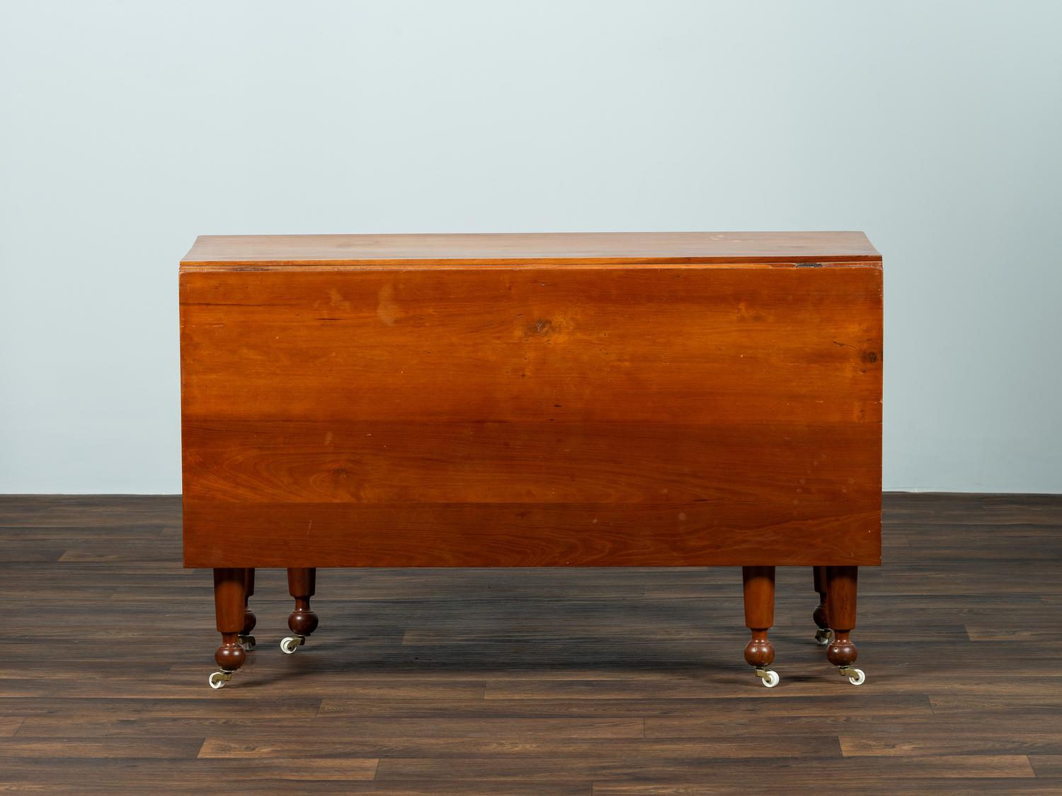 A Late Federal Cherrywood Drop-Leaf Dining Table (Please send consignor donation receipt once donated)