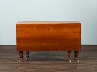 A Late Federal Cherrywood Drop-Leaf Dining Table (Please send consignor donation receipt once donated)