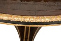 An Ebanista Luciani Walnut and Parcel Gilt Dining Table