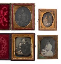 [EARLY PHOTOGRAPHY]. 16 daguerreotypes and ambrotypes with affectionately posed adults and children