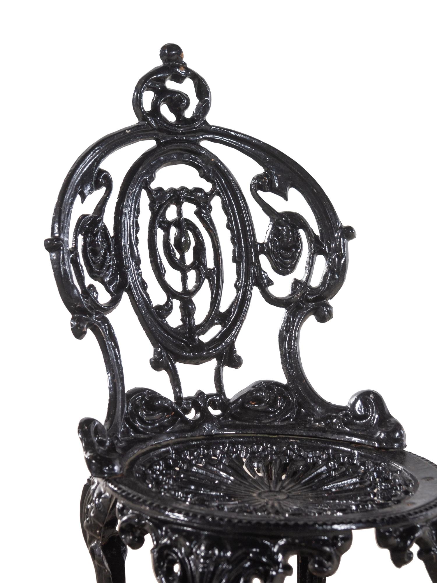 Three Cast Iron Garden Chairs