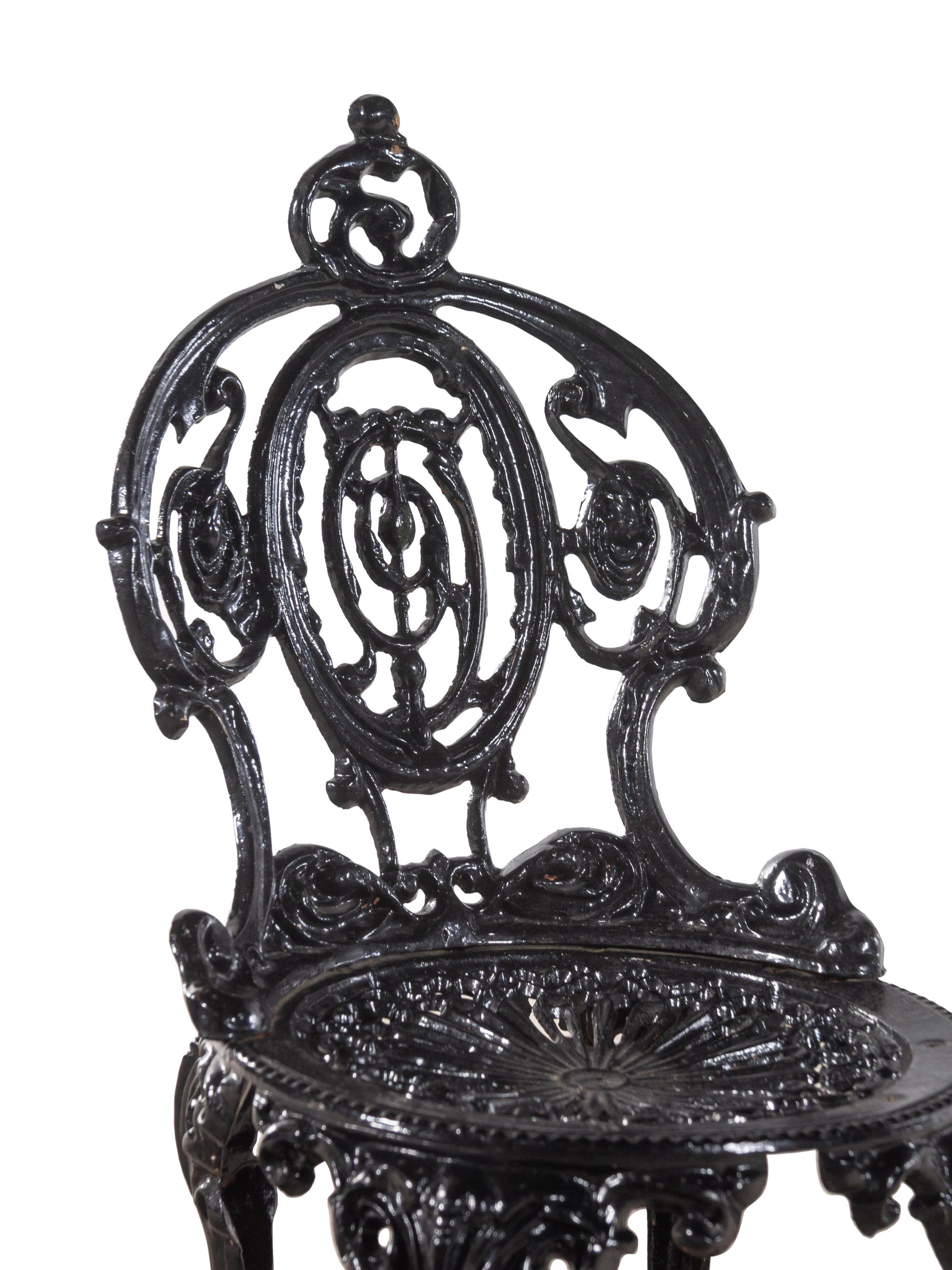 Three Cast Iron Garden Chairs