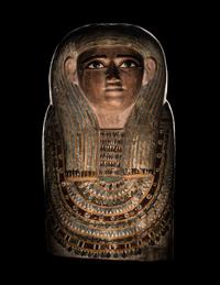 An Egyptian Polychrome Wood Mummy Mask
