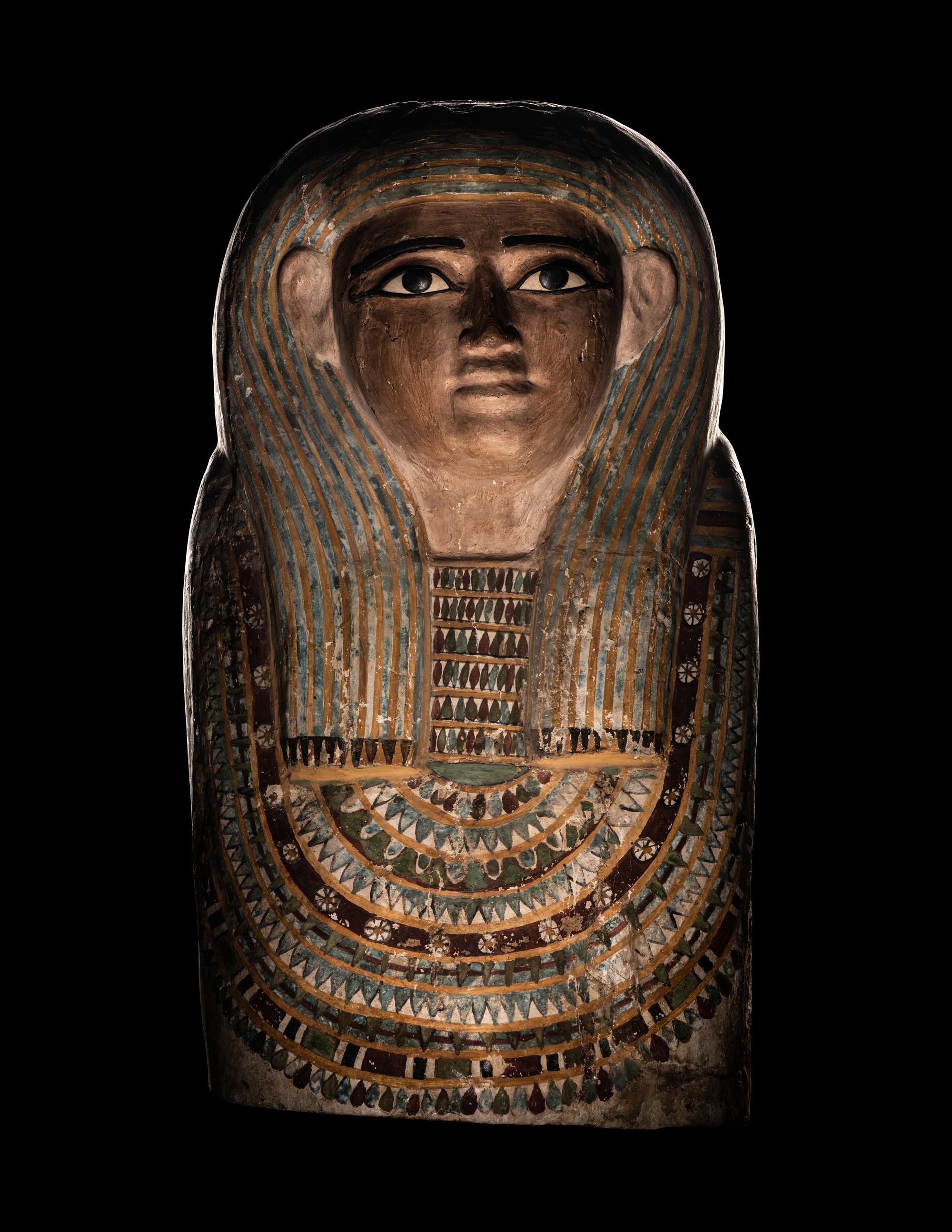 An Egyptian Polychrome Wood Mummy Mask